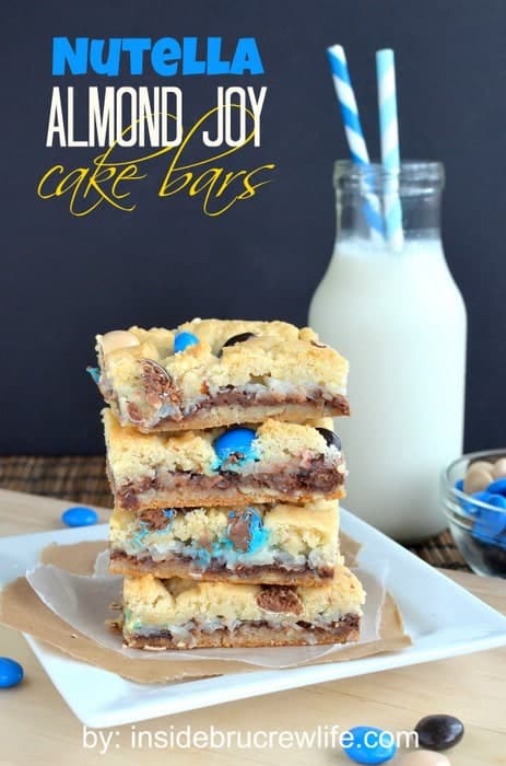 Nutella Almond Joy Cake Bars from insidebrucrewlife.com - cake mix bars filled with Nutella, coconut, and Almond Joy candy pieces 