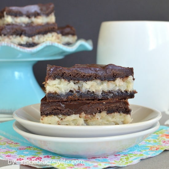 Chocolate Coconut Bars - sweet cookie bars filled with a gooey coconut center and frosted with a simple chocolate glaze. Perfect recipe for the coconut lover in your life.