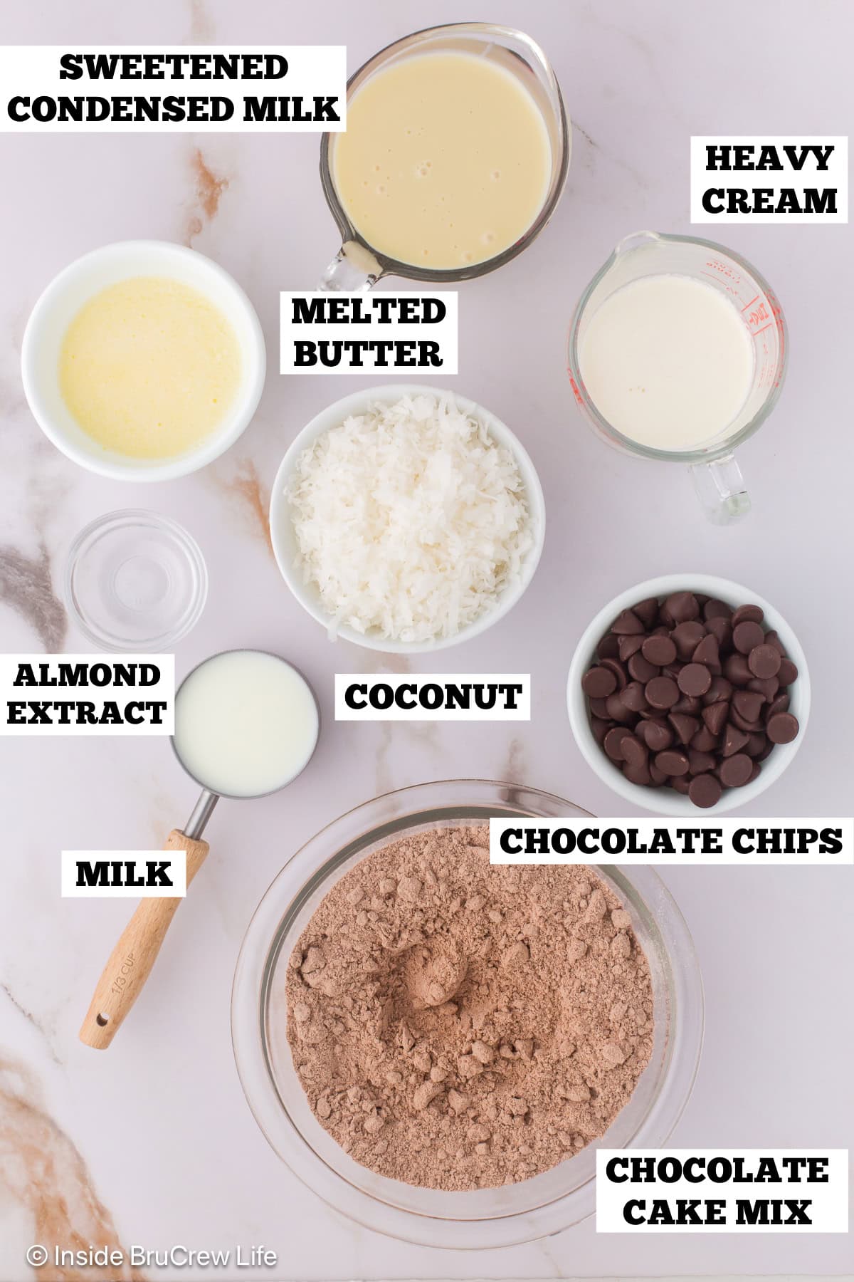 Bowls of ingredients needed to make coconut bars with chocolate.