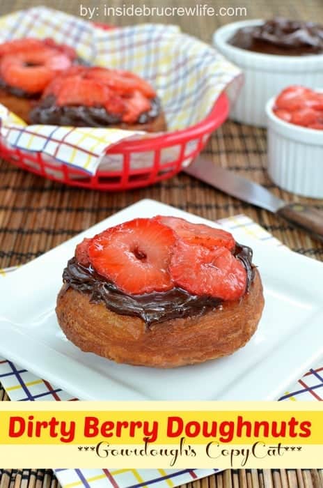 Dirty Berry Doughnuts | Inside BruCrew Life - fried biscuit dough topped with fudge frosting and grilled strawberries #doughnuts #strawberries