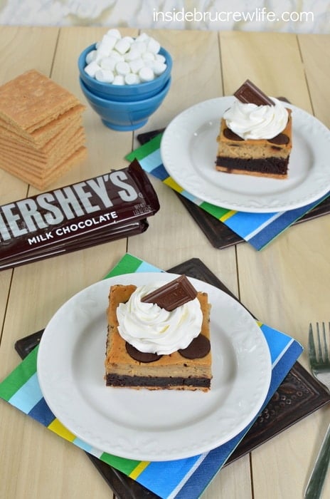 Toasted marshmallow cheesecake, brownies and a graham cracker crust is a fun way to enjoy s'mores for dessert.