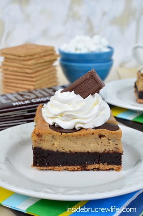 Toasted marshmallow cheesecake, brownies and a graham cracker crust is a fun way to enjoy s'mores for dessert.