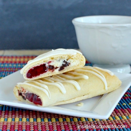 Chocolate chip cheesecake and raspberry pie filling baked inside a crescent roll makes a great breakfast or after school snack 