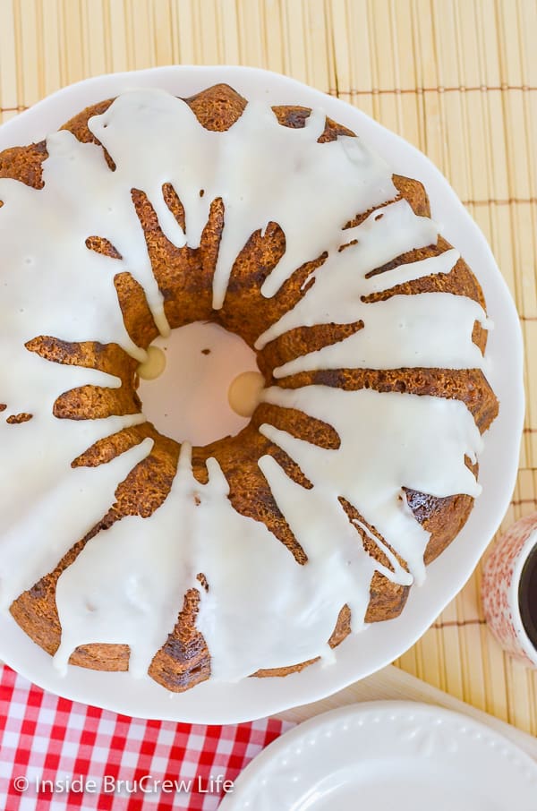 Overhead picture of a caramel apple bundt cake drizzled with apple cider glaze.