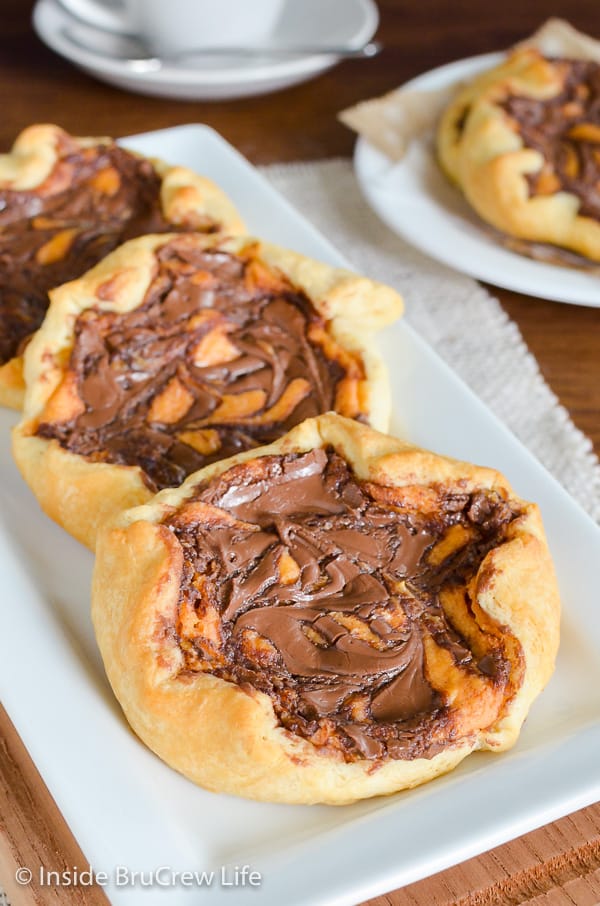 Pumpkin Nutella Cheesecake Danish - swirls of chocolate & pumpkin cheesecake create a delicious fall breakfast pastry. Make this easy cream cheese danish for breakfast or brunch this fall.