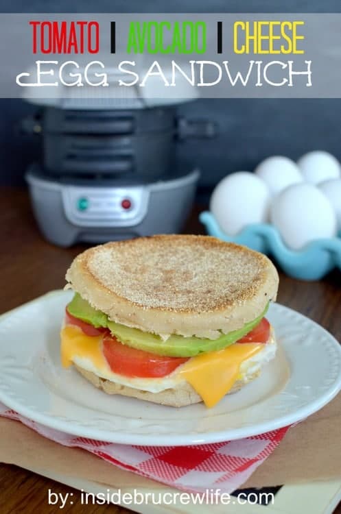 Tomato Avocado Egg Sandwich - the traditional egg sandwich gets a twist from tomato, avocado, and cheese https://insidebrucrewlife.com