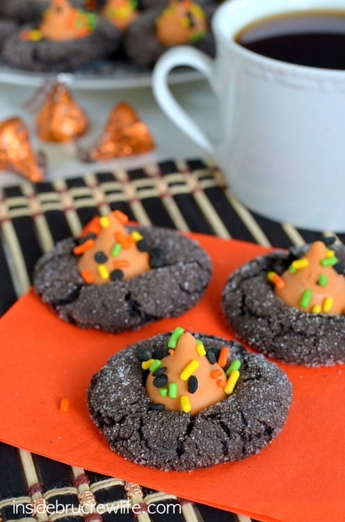 Chocolate mocha kiss cookies with kisses and sprinkles.