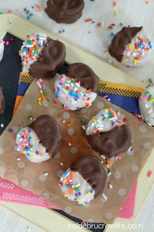 Caramel Pretzel Cookie Dough Bites from www.insidebrucrewlife.com - no bake caramel cookie dough in between pretzels and dipped in chocolate