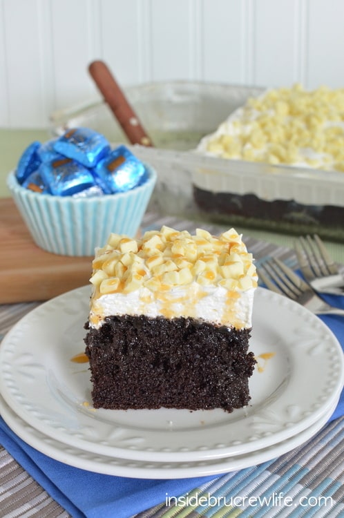 Chocolate, caramel, and candy bars make this cake an amazing dessert!  