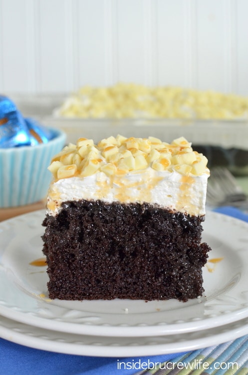 Chocolate, caramel, and candy bars make this cake an amazing dessert!  