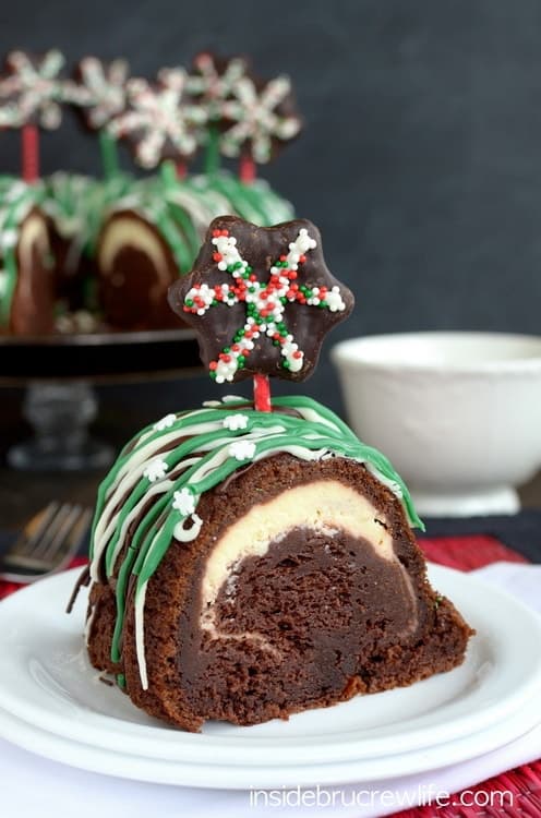 Chocolate Peppermint Cheesecake Cake - chocolate cake, peppermint cheesecake, and chocolate decorations make this one spectacular cake for the holidays!