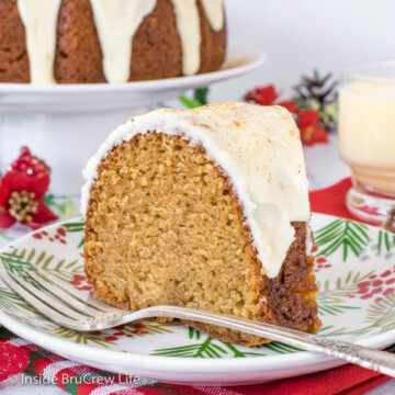 A slice of Eggnog Bundt Cake on a white plate with a fork