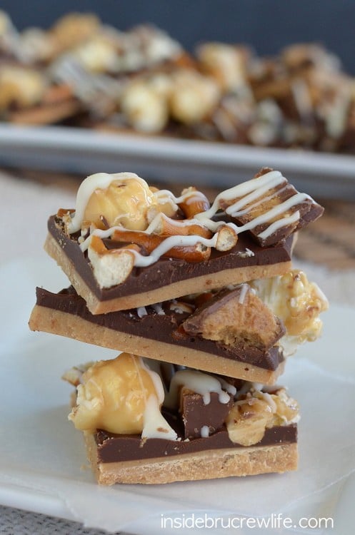 Three pieces of chocolate candies stacked on top of each other.