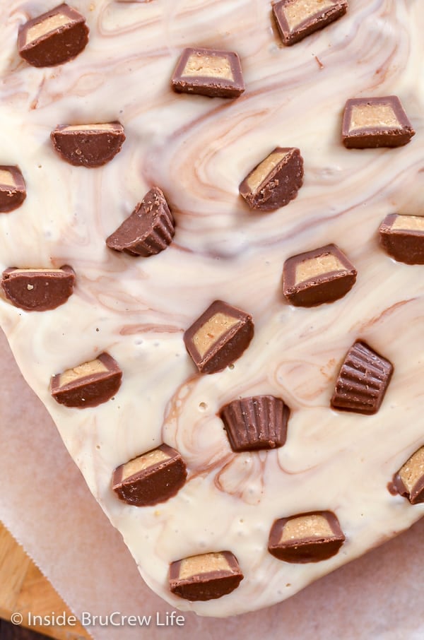 An overhead picture of an uncut batch of White Chocolate Peanut Butter Cup Fudge.