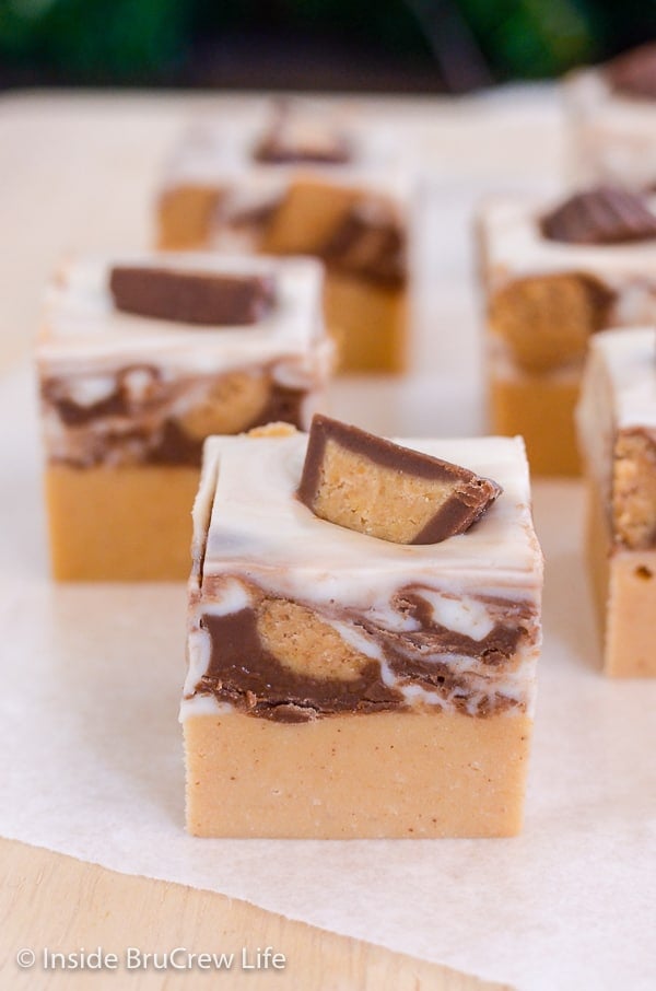 A close up of a piece of White Chocolate Peanut Butter Cup Fudge.