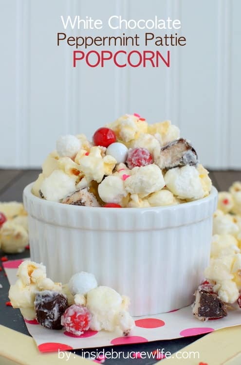 White Chocolate Peppermint Pattie Popcorn - peppermint candies and white chocolate will have you devouring the whole bowl of popcorn in a hurry! Great snack mix recipe!