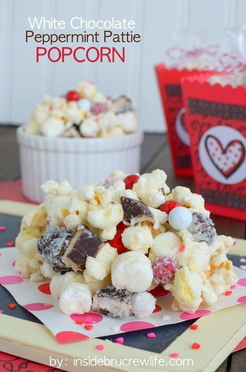 White Chocolate Peppermint Pattie Popcorn - white chocolate covered popcorn loaded with marshmallows, peppermint candies, & sprinkles! Great snack mix recipe!