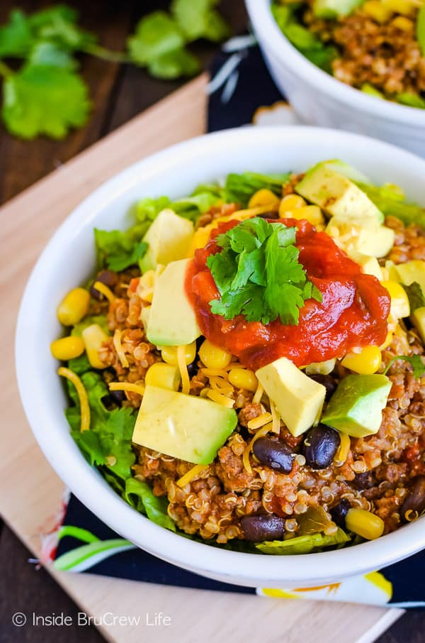 Taco Salad Bowls - these easy salad bowls are a healthy way to enjoy a taco. Make this easy recipe and let everyone top their salad with their favorite toppings. #salad #tacosalad #easy #dinner #30minutemeal #tacotuesday
