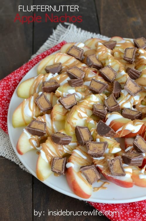 Apples drizzled with peanut butter, marshmallow, and Reese's PB cups is the best way to eat an apple a day!