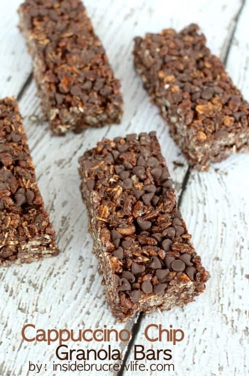 Four cappuccino chip granola bars on a white background