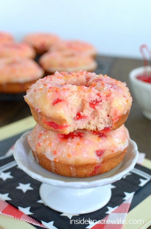 These soft baked donuts have a refreshing and light flavor from the lemonade and cherry pieces.