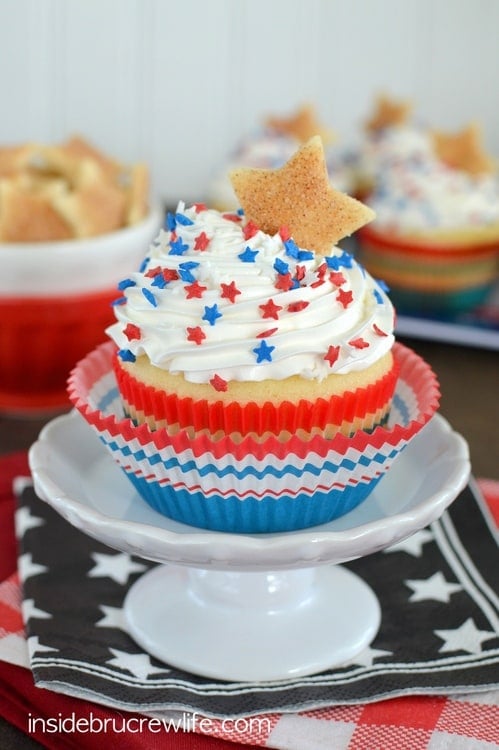 Vanilla Cherry Pie Cupcakes - homemade cupcakes filled with cherry pie filling. Fun recipe for summer picnics!