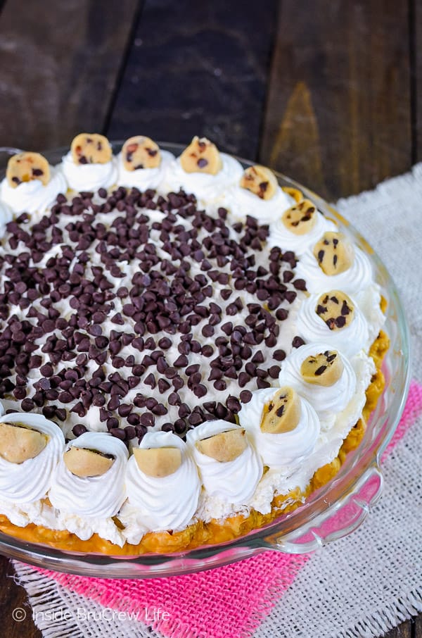 Cookie Dough Cheesecake Brownie Pie - little cookie dough bites inside a creamy cheesecake turn this brownie pie into an amazing dessert. This is a must make recipe for parties! #browniepie #cookiedoughbites #nobakecheesecake #bestdessert #cheesecakelove