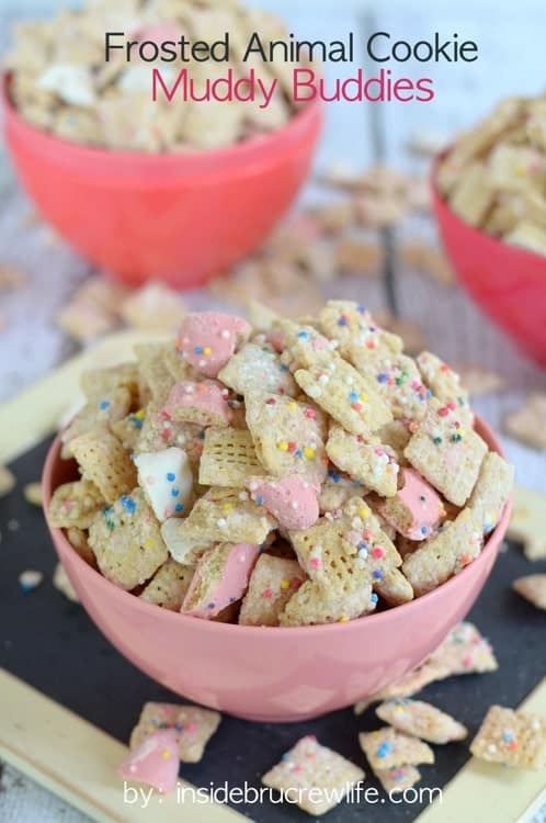 Crushed animal cookies and chocolate coat this easy muddy buddies snack mix.  It will disappear in a hurry!