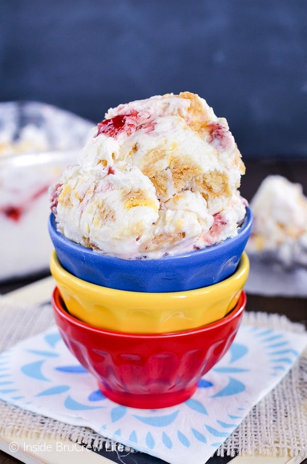 Lemon Oreo Strawberry Swirl Ice Cream - no churn lemon ice cream loaded with cookie chunks and strawberry preserves is a delicious treat on a hot day. Easy recipe to make for summer. #icecream #lemon #homemade #nochurn #strawberry #summerdessert 