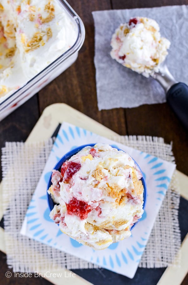 Lemon Oreo Strawberry Swirl Ice Cream - this easy no churn ice cream has strawberry swirls and cookie chunks in it. This is the perfect recipe to make for hot summer days. #icecream #lemon #homemade #nochurn #strawberry #summerdessert 