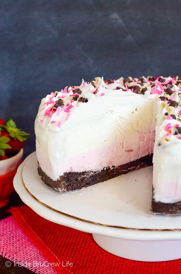 Neapolitan Brownie Ice Cream Cake - homemade brownies, vanilla ice cream, and strawberry ice cream makes a delicious ice cream cake. #icecreamcake #brownies #cake #easyrecipe