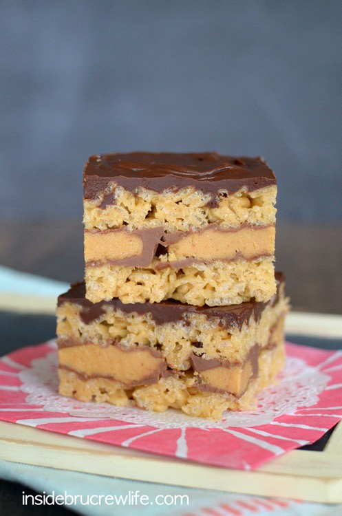 Two squares of Reese's stuffed rice krispie treats stacked on top of each other