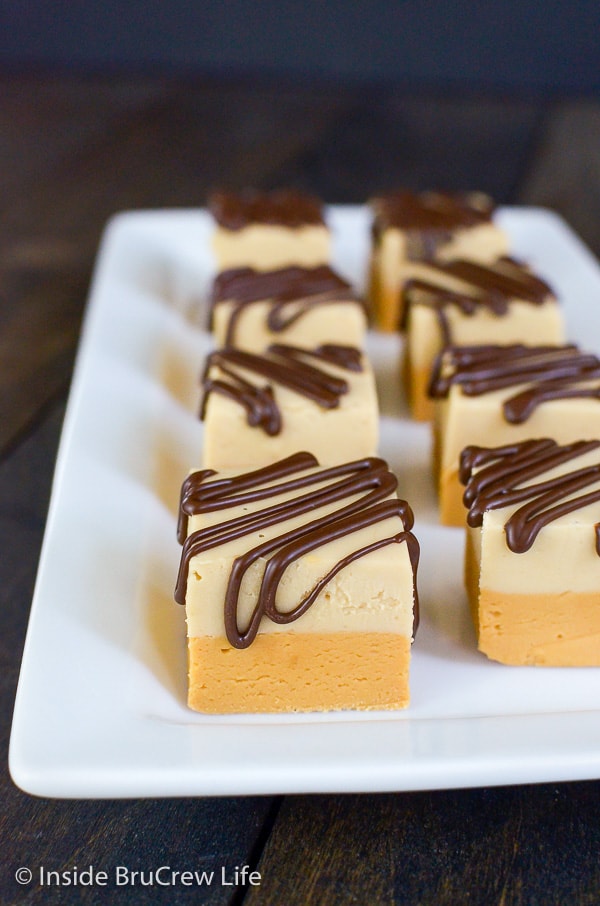 Caramel Coffee Fudge - this easy fudge recipe has layers of caramel and coffee fudge drizzled with more chocolate! It's a great recipe to make for holiday parties!