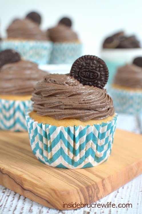 Peanut Butter Oreo Cupcakes - homemade peanut butter cupcakes with a hidden Oreo cookie and fluffy chocolate frosting