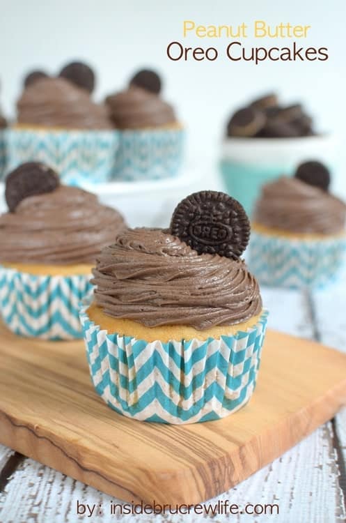 Peanut Butter Oreo Cupcakes - homemade peanut butter cupcakes with a hidden Oreo cookie and fluffy chocolate frosting