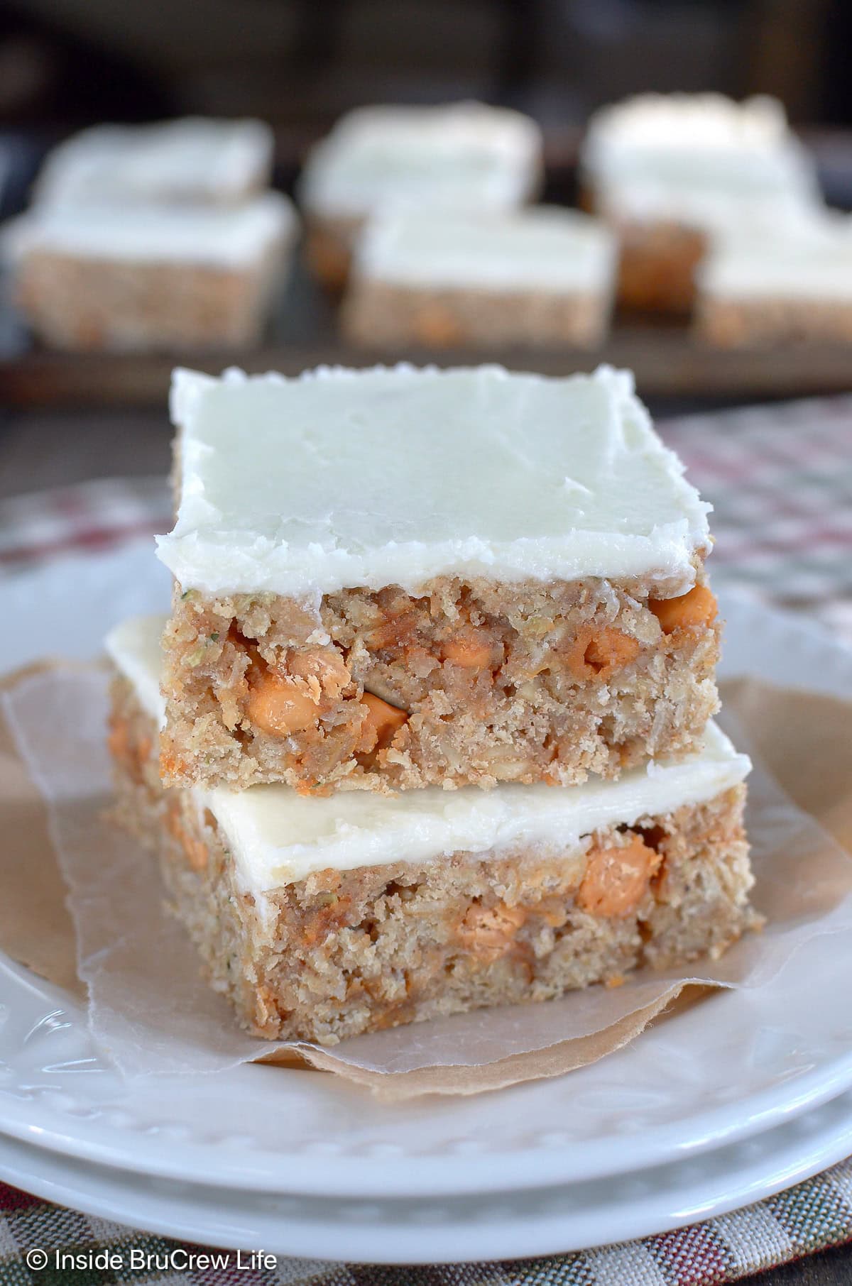 A white plate with zucchini oat bars on it.