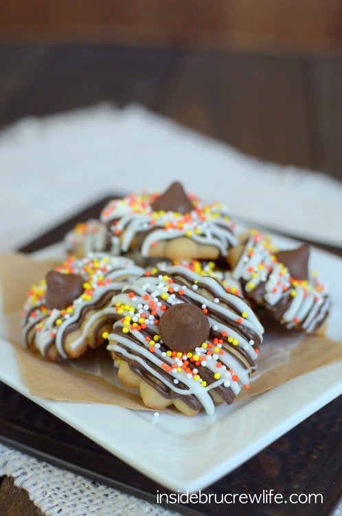 These easy coffee spritz cookies are covered in chocolate drizzles and sprinkles. Perfect fall treat!!!