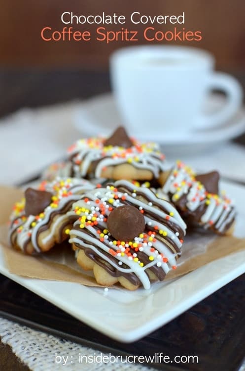 These easy coffee spritz cookies are covered in chocolate drizzles and sprinkles. Perfect fall treat!!!