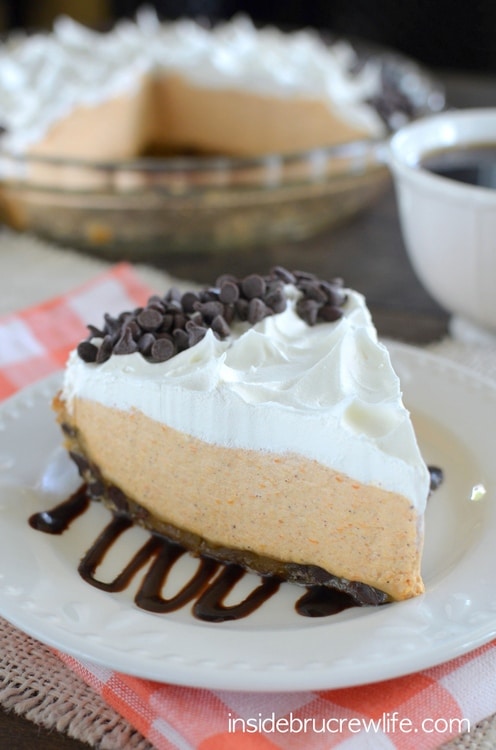 A chocolate chip cookie crust filled with no bake pumpkin mousse is a fall favorite!