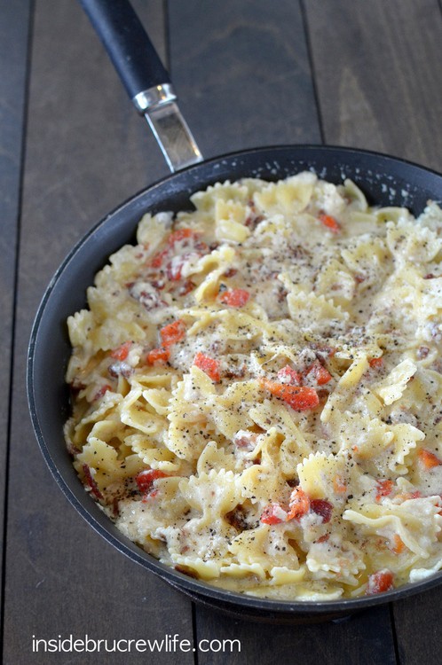 Easy homemade Alfredo sauce that can be made in minutes. Bacon, red peppers, and popcorn shrimp make this pasta taste amazing!