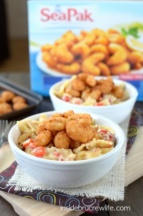 Easy homemade Alfredo sauce that can be made in minutes. Bacon, red peppers, and popcorn shrimp make this pasta taste amazing!