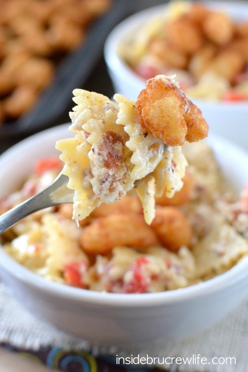 Easy homemade Alfredo sauce that can be made in minutes. Bacon, red peppers, and popcorn shrimp make this pasta taste amazing!