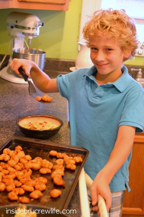 Kids helping to serve Bacon Shrimp Alfredo