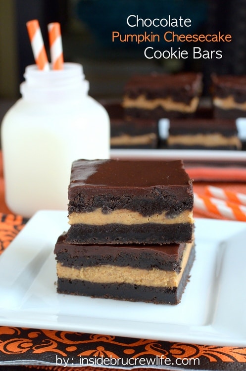 Creamy pumpkin cheesecake inside a chocolate cookie bars is the way to do fall desserts.