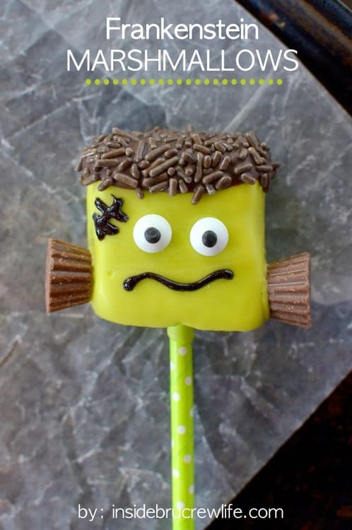 Square marshmallows dipped in green candy melts make a cute Frankenstein treat for Halloween. The googly eyes are too cute!