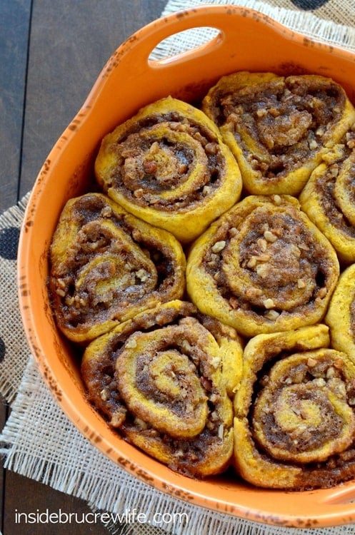 Easy no yeast cinnamon rolls full of pumpkin and pecan goodness and covered in cream cheese frosting! You are going to love these!