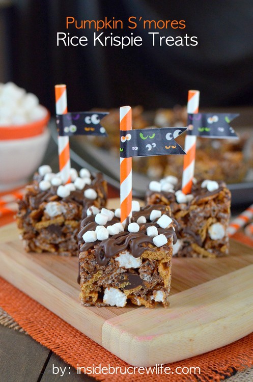 Pumpkin S'mores Rice Krispie Treats - lots of marshmallows and chocolate add a fun flair to these no bake Golden Graham bars. Make these easy treats for Halloween parties.