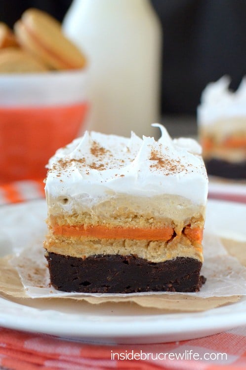 Layers of brownies, cookies, and coffee cheesecake make these Pumpkin Spice Latte Brownies a fun fall dessert recipe!