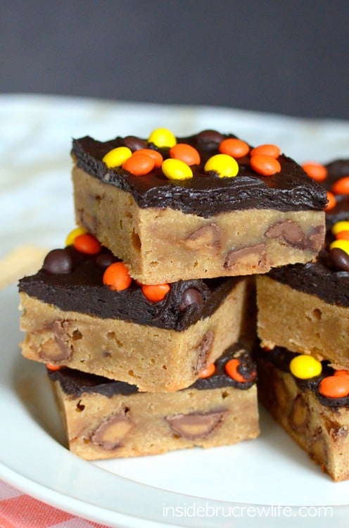 Reese's Peanut Butter Bars - peanut butter brownies loaded with Reese's candies and chocolate frosting is a great dessert recipe.