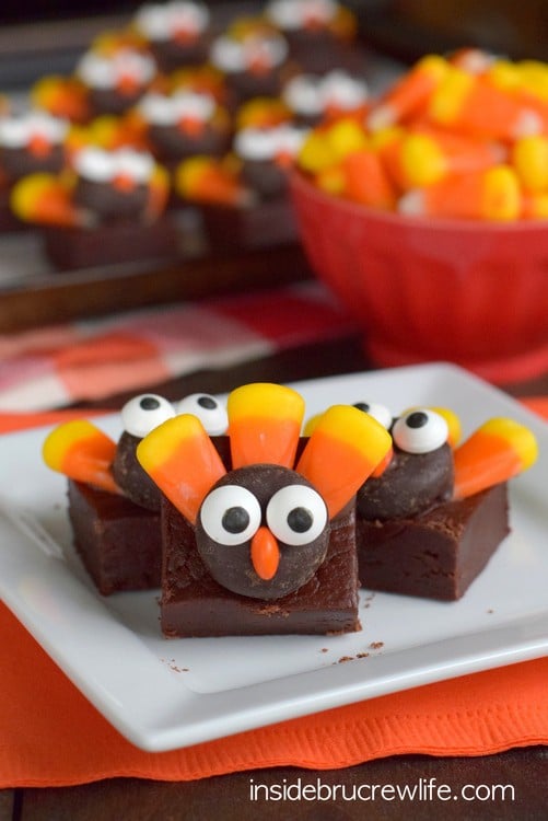 These easy no bake chocolate fudge squares topped with a cute candy turkeys make perfect Thanksgiving day treats!